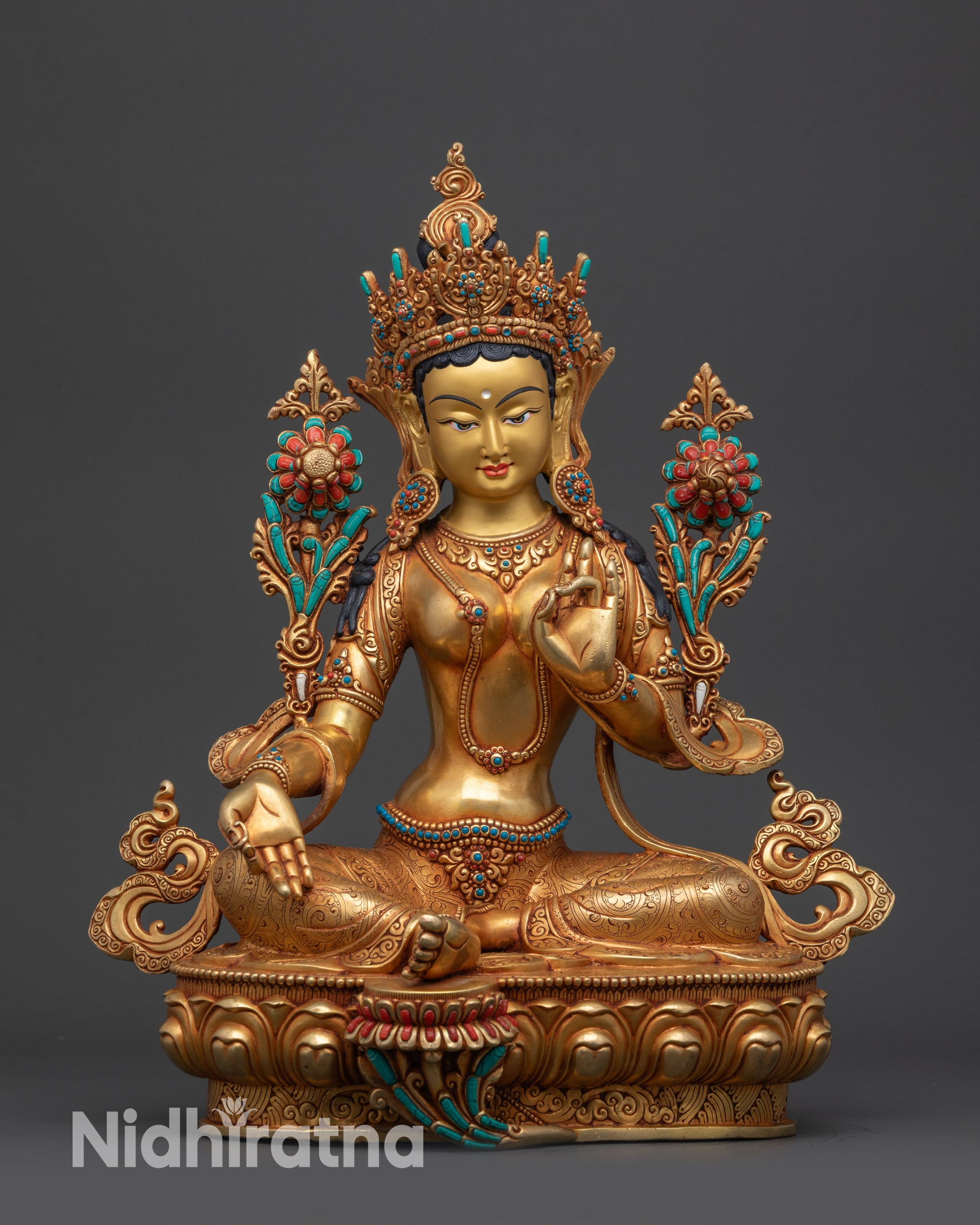 front view green tara statue with gold fire gilded body and lotus throne
