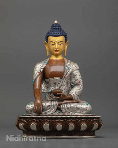 front view of Oxidized Shakyamuni Buddha Statue with 24K gold-gilded face and lotus base