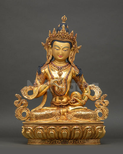 front view of Vajrasattva Sculpture with 24K gold-gilded face and lotus seat