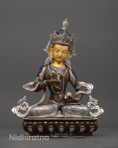 front view of Vajrasattva Statue with 24K gold-gilded face, nectar vase, and lotus throne