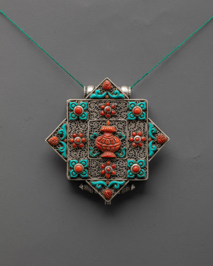 front view of artisan-crafted Treasure Vase locket with silver body and coral turquoise stones