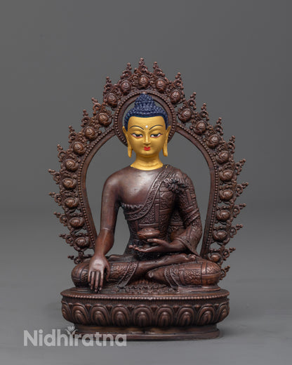 front view of machine-made Buddha Shakyamuni statue with gold-plated face and brown oxidized copper