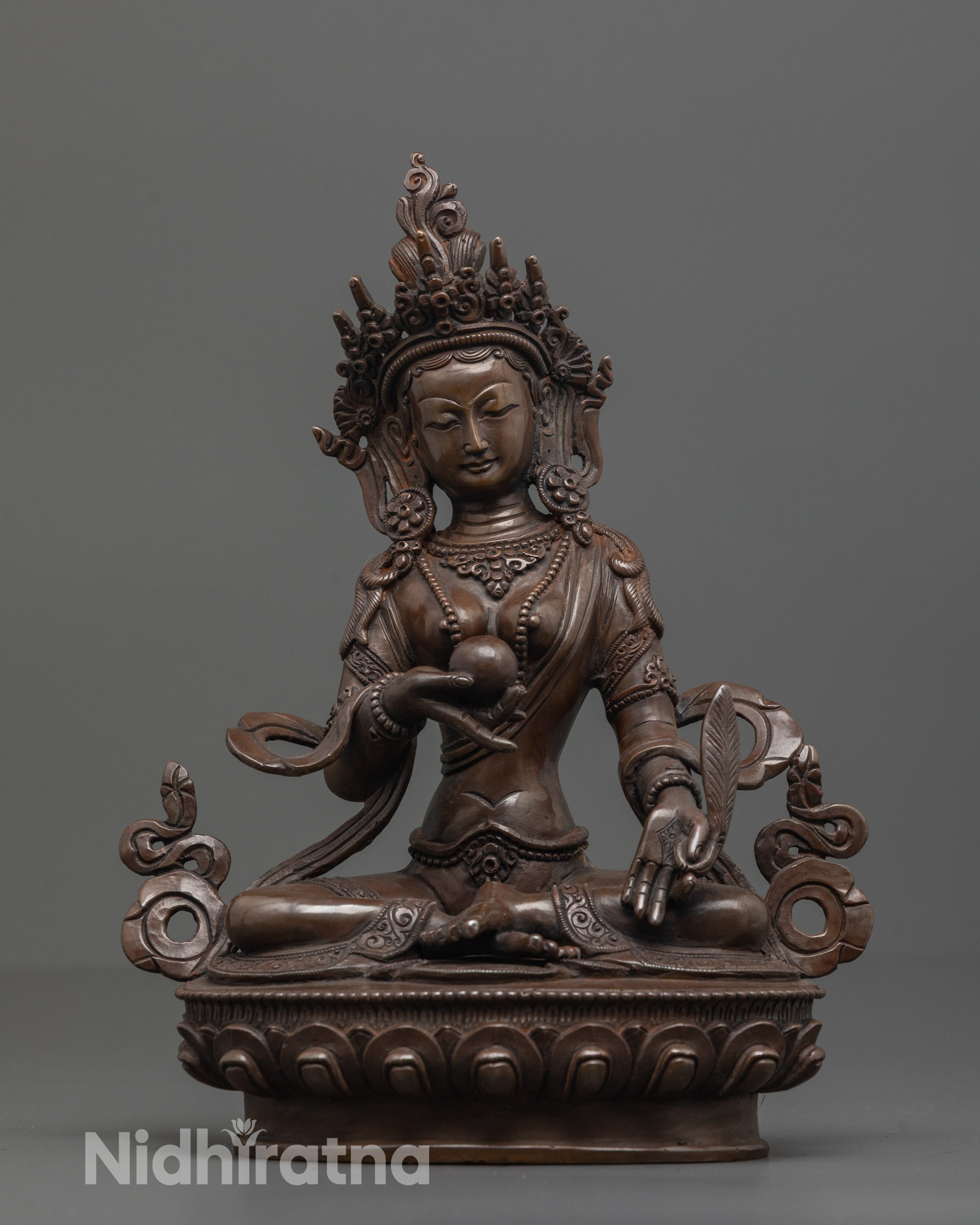 front view of oxidized copper ksitigarbha statue with chintamani and lotus seat