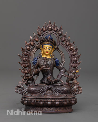 front view of precision crafted vajrasattva statue with gold face and oxidized copper body