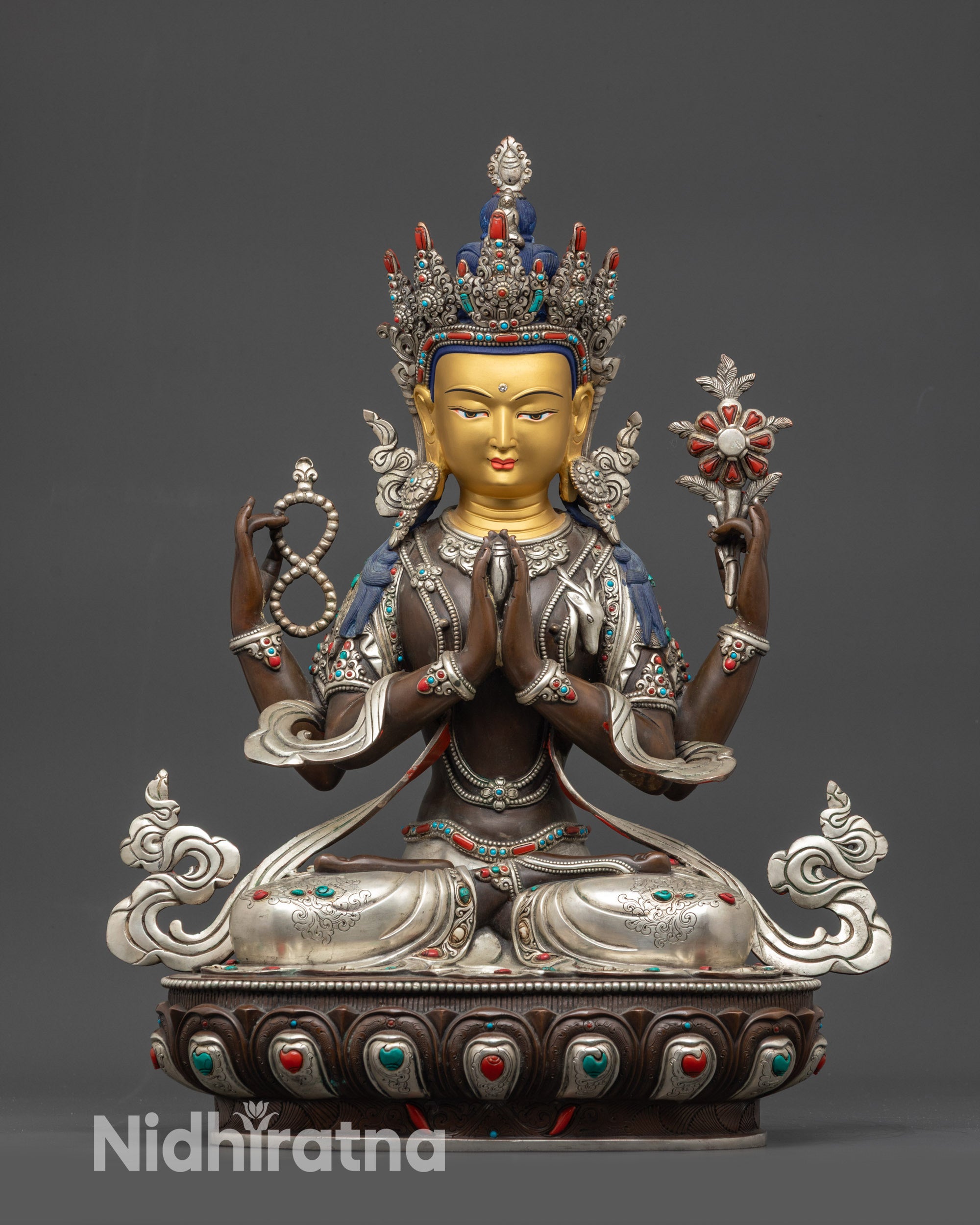 front view oxidized Chenrezig statue with 24K gold-gilded face on lotus pedestal