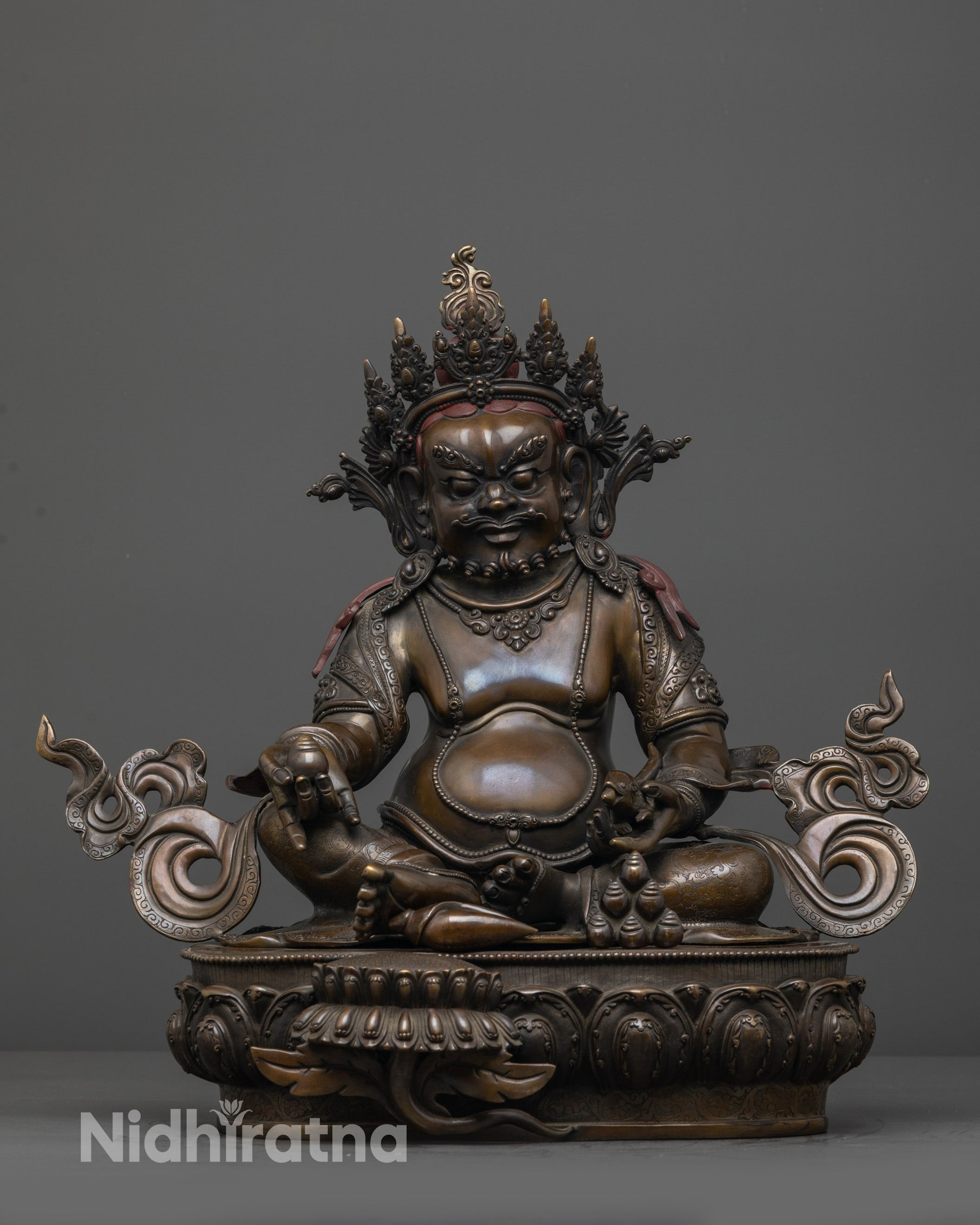 front view oxidized Dzambhala statue with jeweled crown and lotus seat
