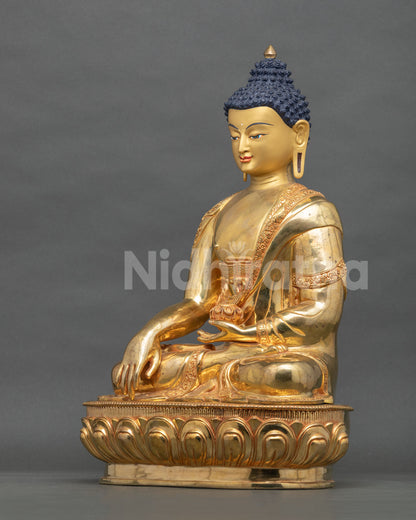Full side view of Shakyamuni Buddha statue seated on a lotus base, handcrafted in Patan, Nepal