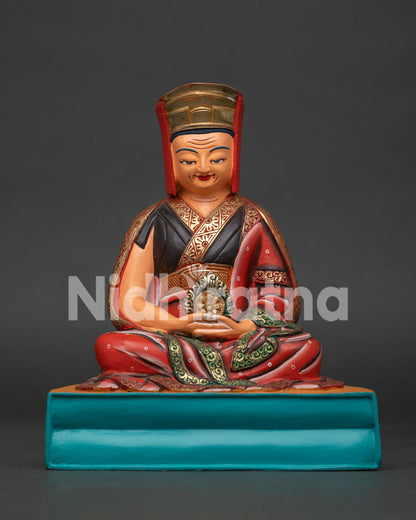Gampopa statue, front view of handcrafted copper Dagpo Kagyu master with scholar's hat