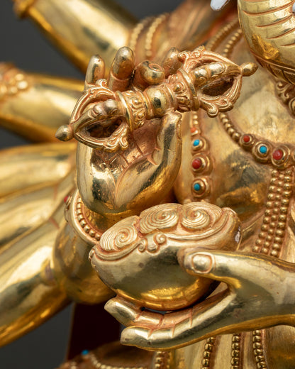 Ganesh statue hand mudra gesture with gold bracelet and gem beads