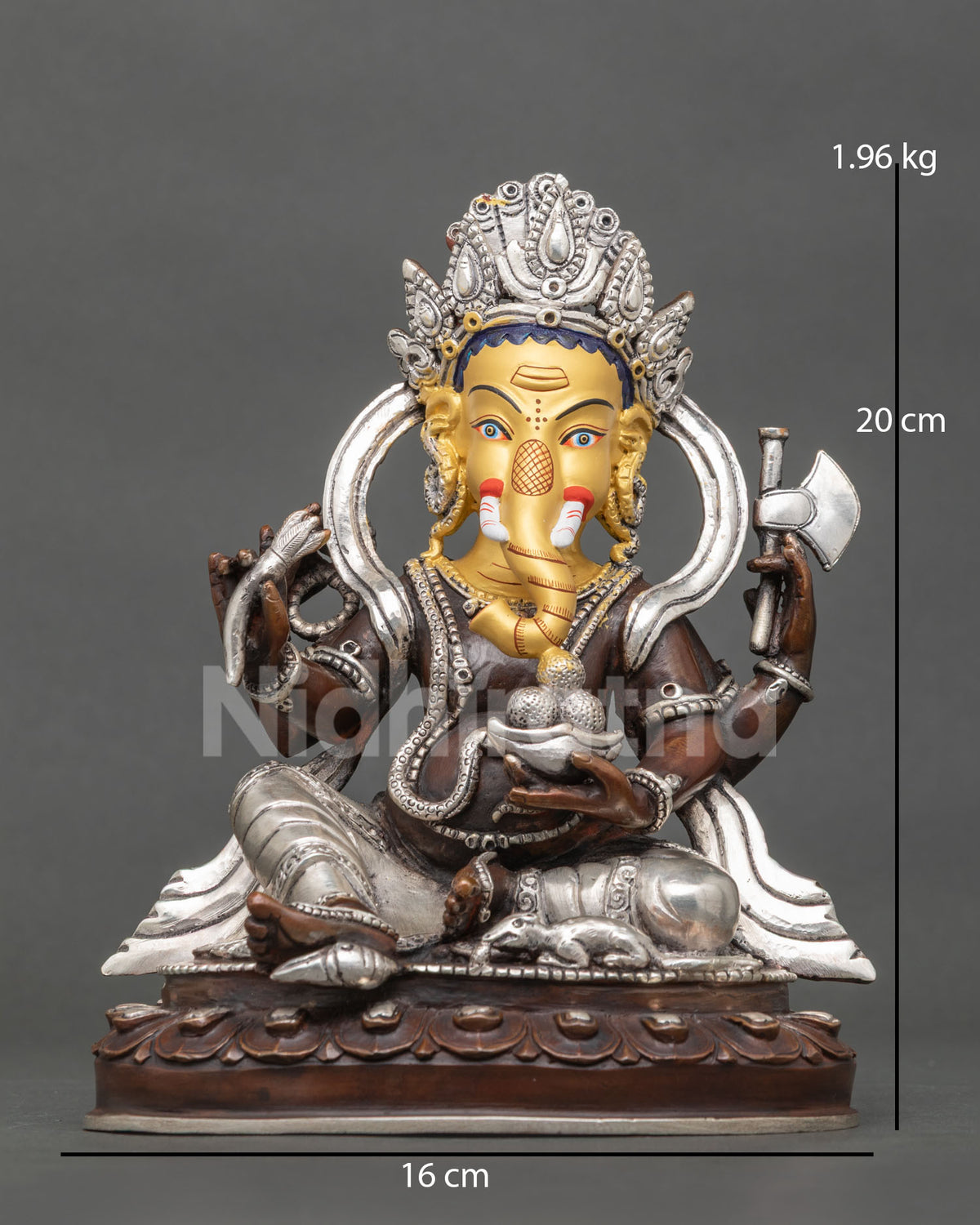 Ganesh statue handcrafted Newari artists Patan Nepal copper oxidized silver plated 24K gold painted face.
