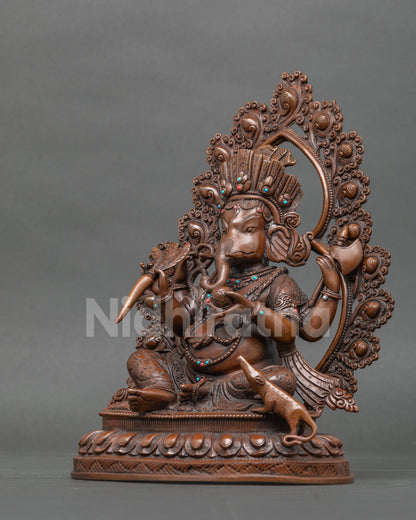 Ganesh Statue left side view with crown flowing robes and halo.