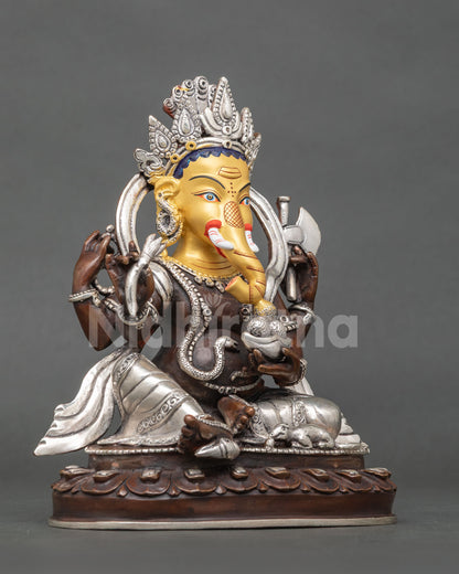 Ganesh statue right view four armed Lord Ganesha lotus pedestal oxidized copper silver plated finish.