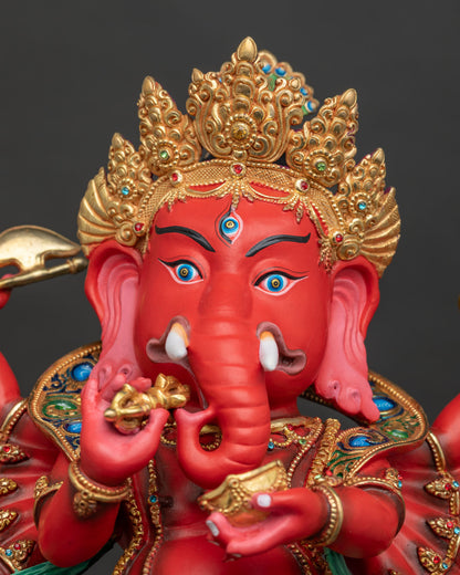 Ganesh statue side face closeup showing third eye crown and detailed facial features.