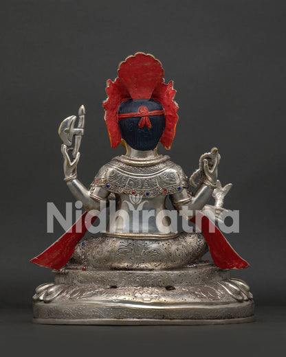 Ganesh statue back view displaying silver-plated handcrafted deity with detailed lotus throne base