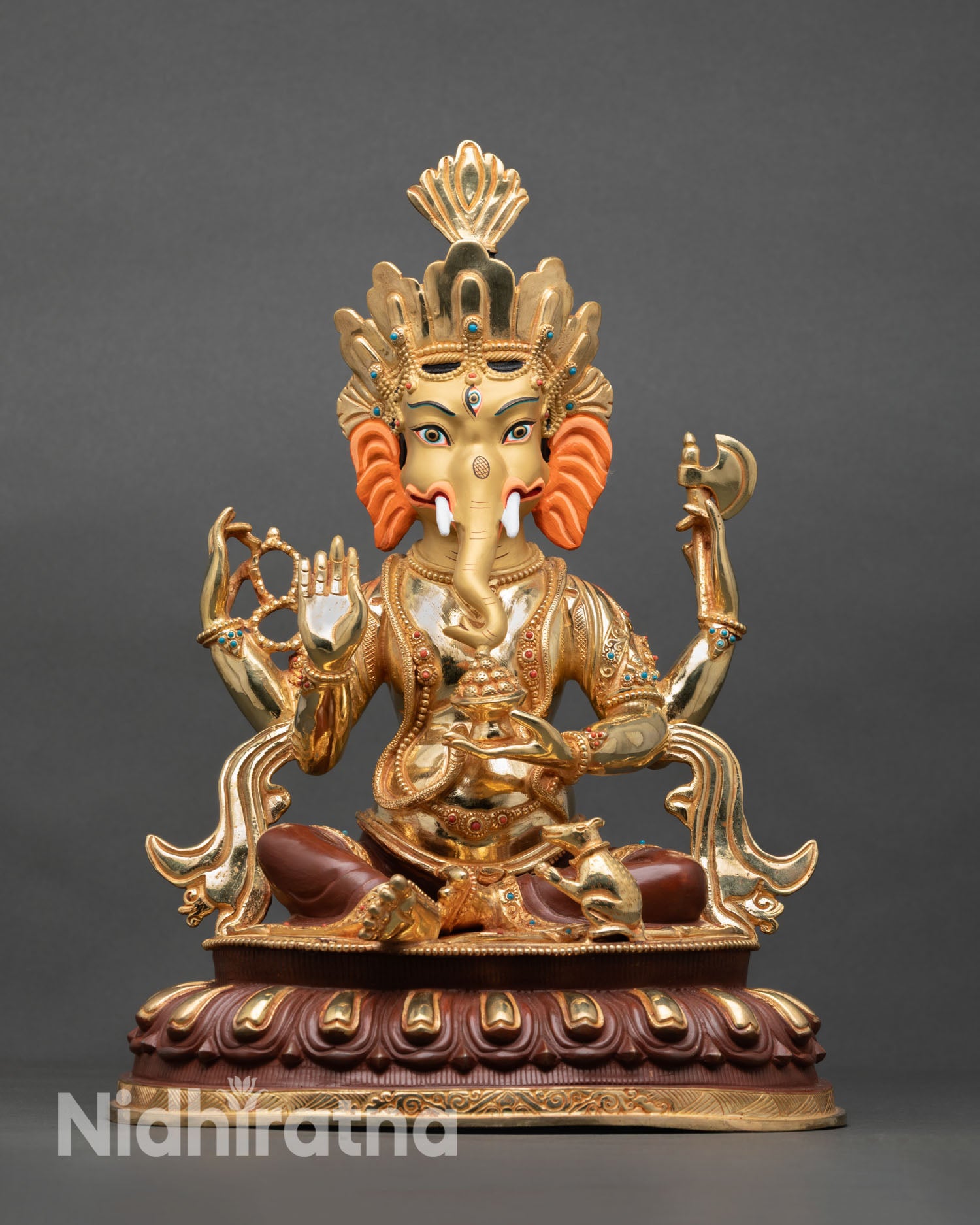 Ganesha statue front view, lost wax casting, copper sculpture, gold-painted face, oxidized finish, Nepal handmade