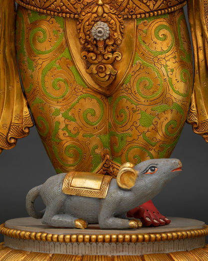 Ganesha statue lower garment detail with Mushika mouse vahana at feet