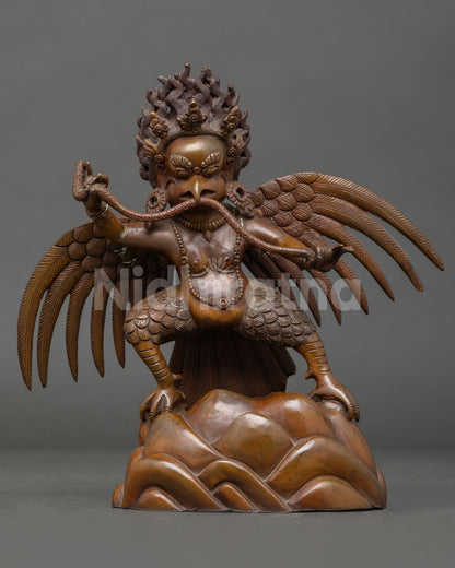 Garuda statue, handmade in Nepal with oxidized copper finish and powerful guardian posture