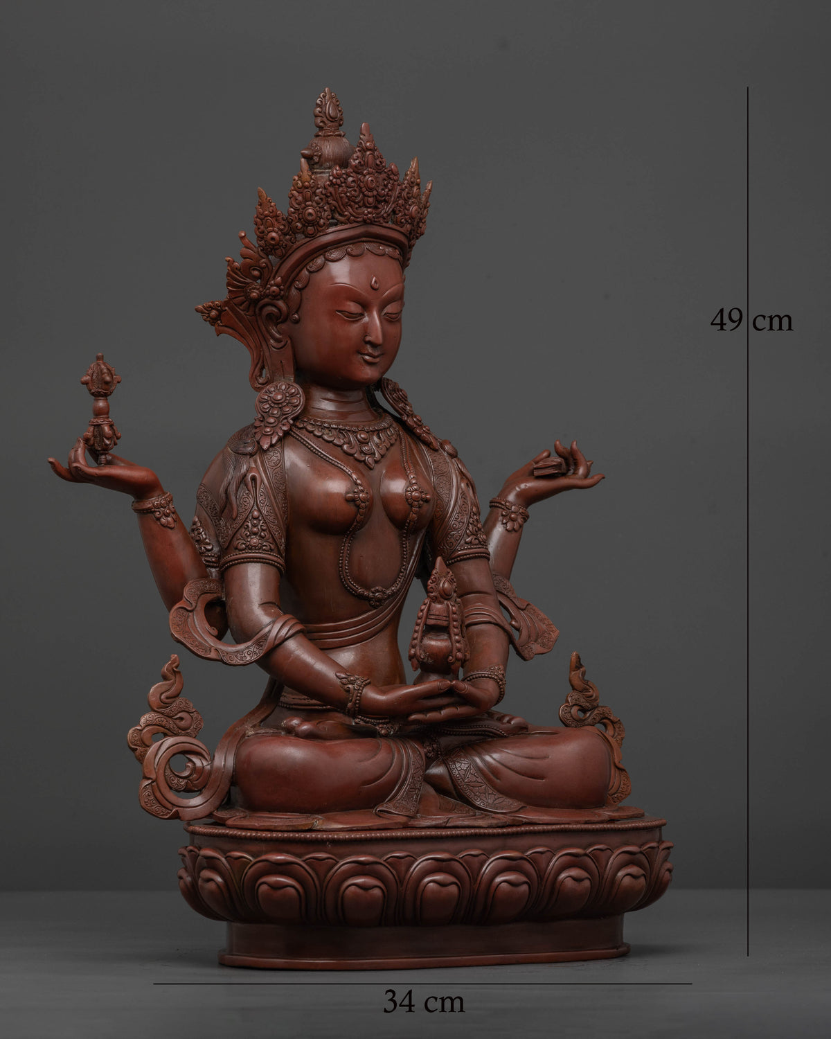 Goddess Prajnaparamita holding sutra vajra and kalash symbolizing transcendent wisdom