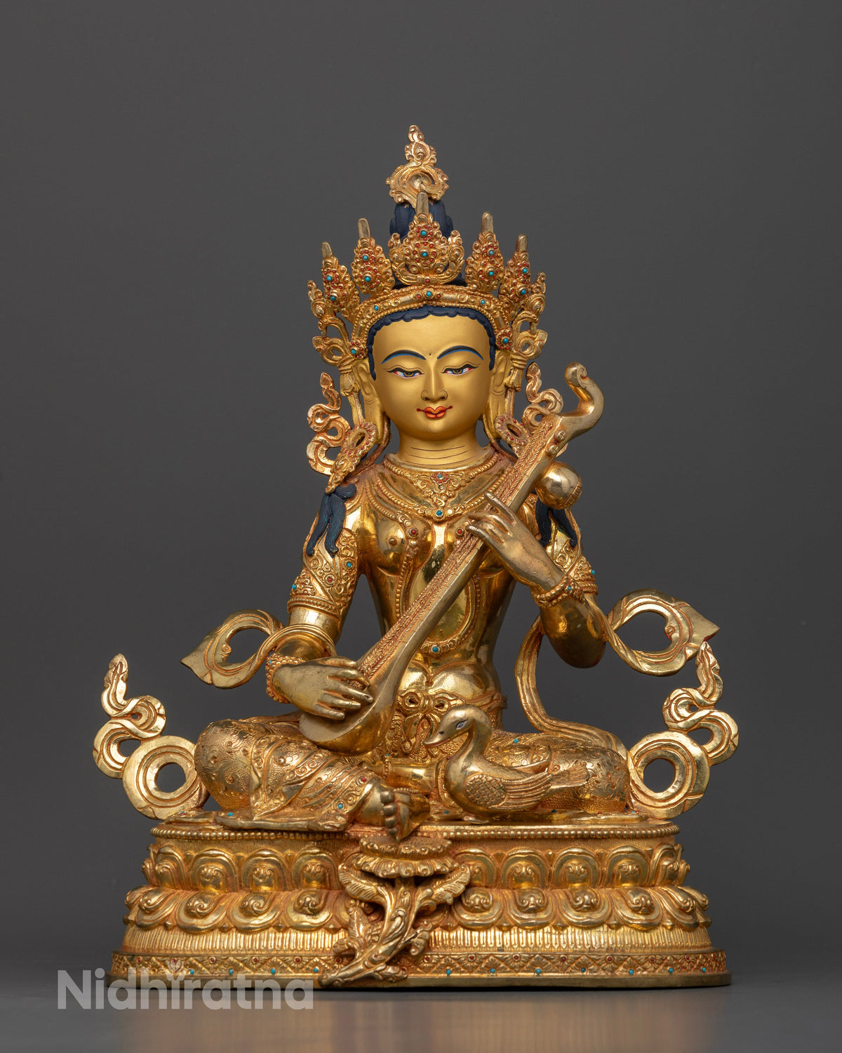Goddess Saraswati Statue gold fire gilded copper handcrafted in Nepal.