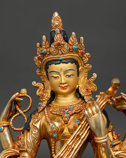 Goddess-saraswati-face-with-gold-painted-details-and-semi-precious-stone-decoration.