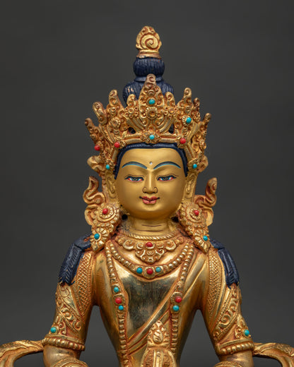 Gold fire gilded Amitayus statue with 24K gold painted face and stones.