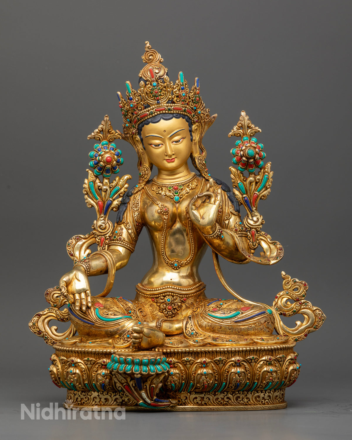 Gold-fire gilded Green Tara statue handcrafted by Newari artisans in Patan Nepal.