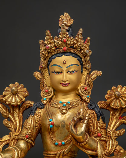 Gold fire gilded Green Tara statue with 24K gold painted face and stones.