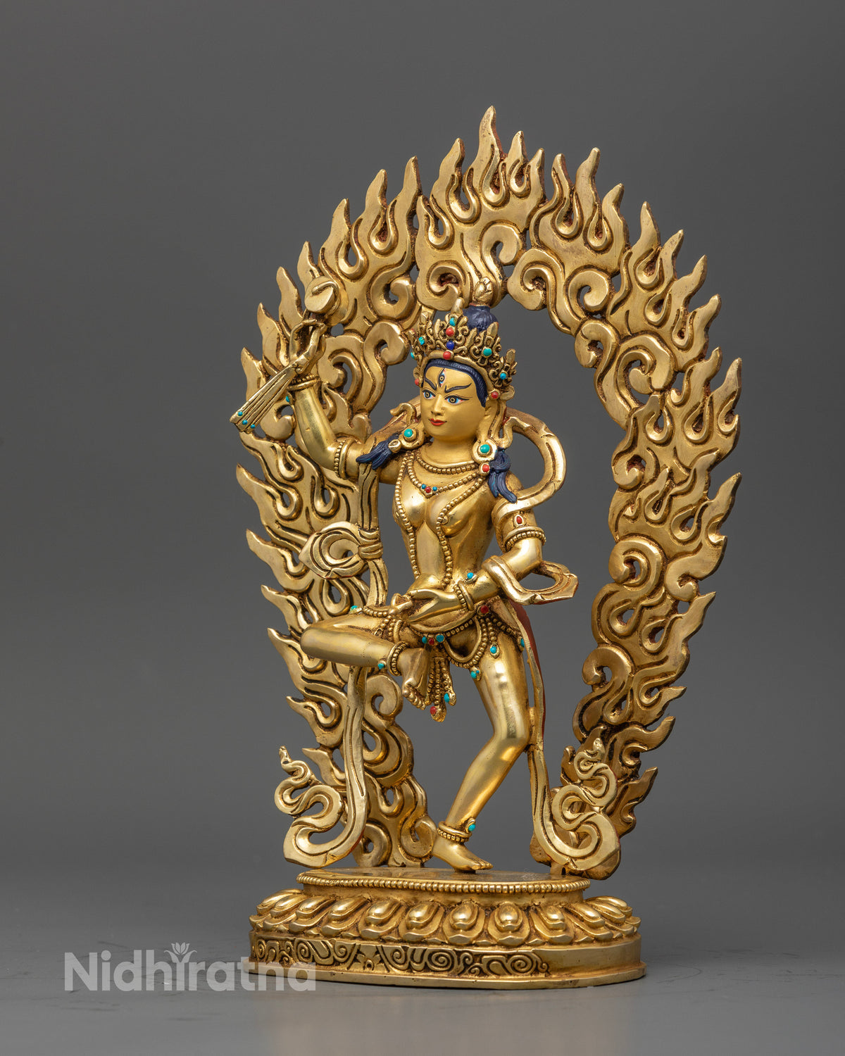 Gold fire gilded Machig Labdron statue with jeweled crown and halo.
