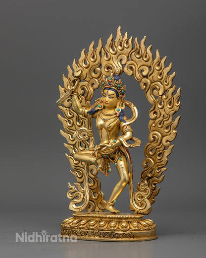 Gold fire gilded Machig Labdron statue with jeweled crown and halo.