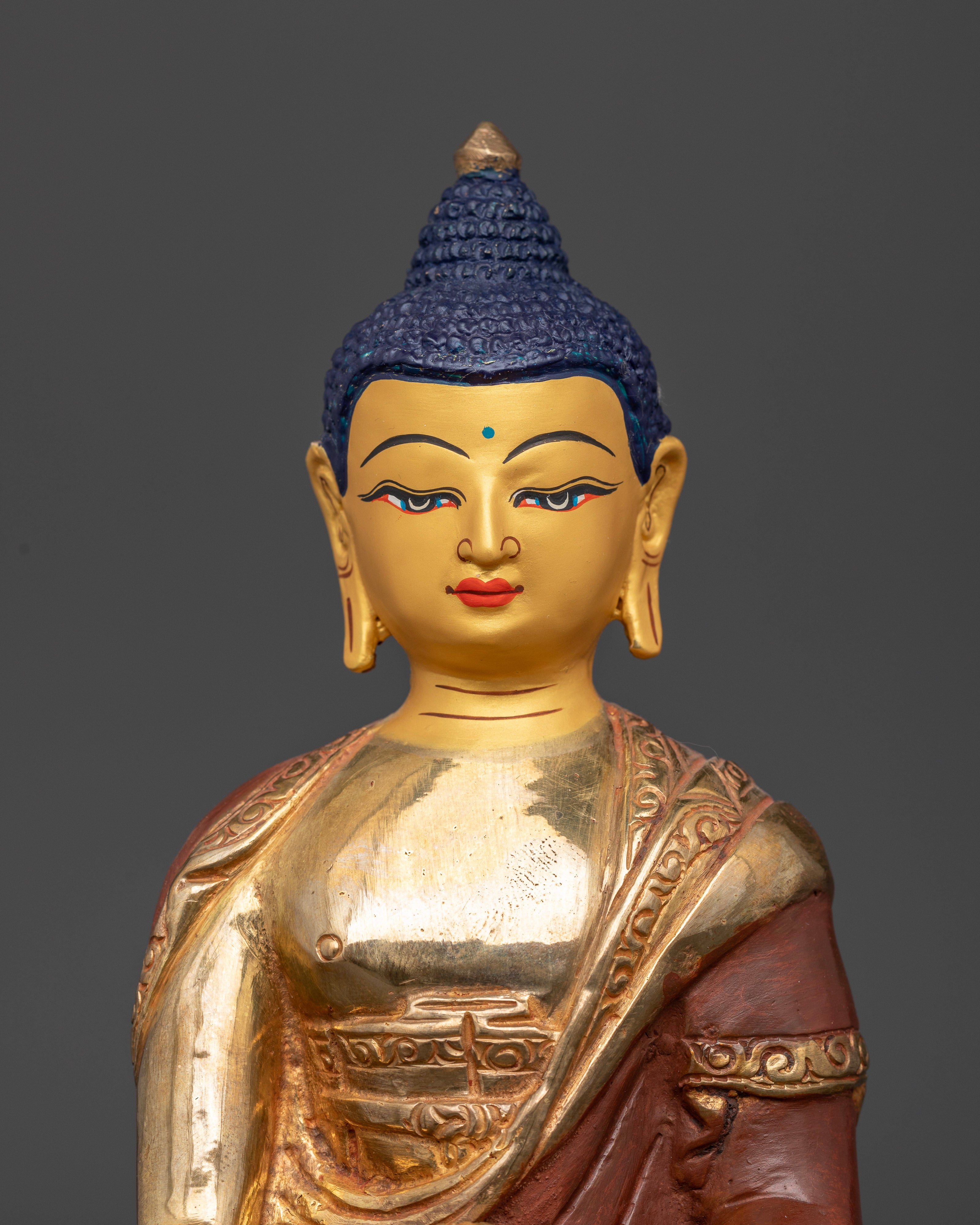 Gold fire gilded shakyamuni buddha statue with 24k gold face.