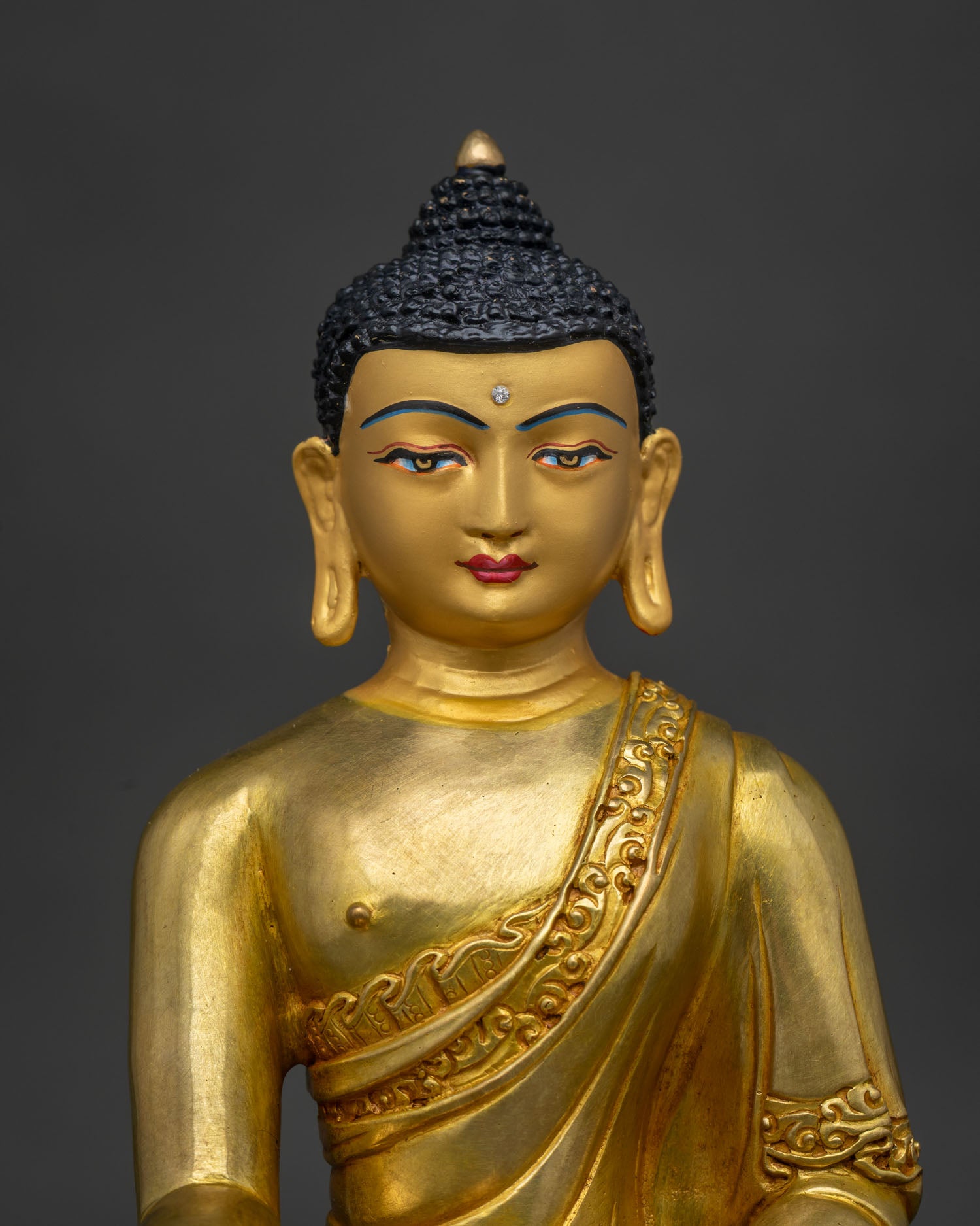Gold fire gilded Shakyamuni Buddha statue with 24K gold painted face.