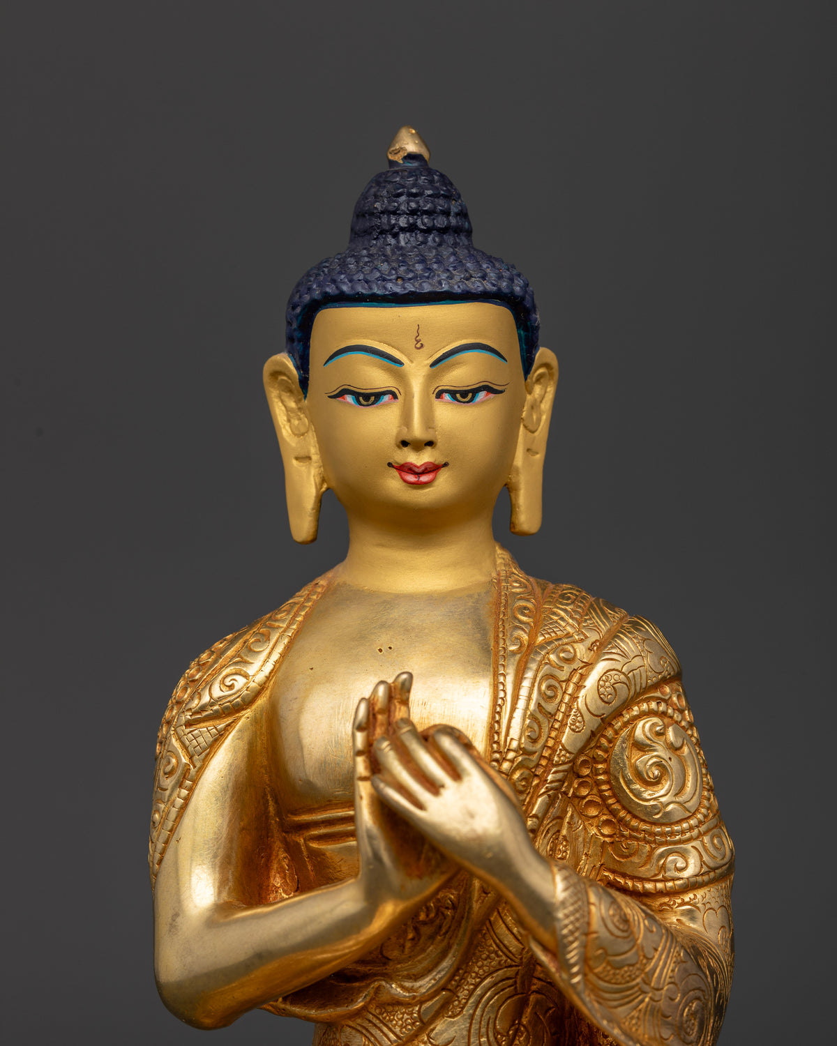Gold fire gilded vairocana buddha statue with 24k gold painted face.
