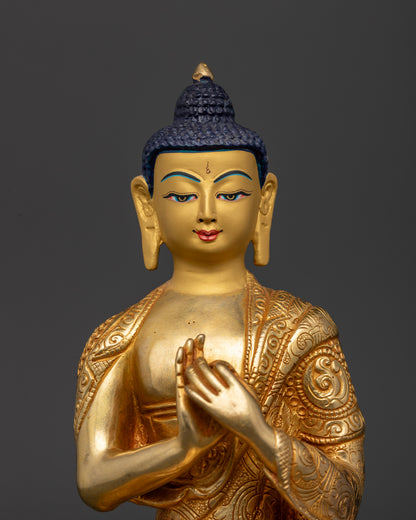 Gold fire gilded vairocana buddha statue with 24k gold painted face.
