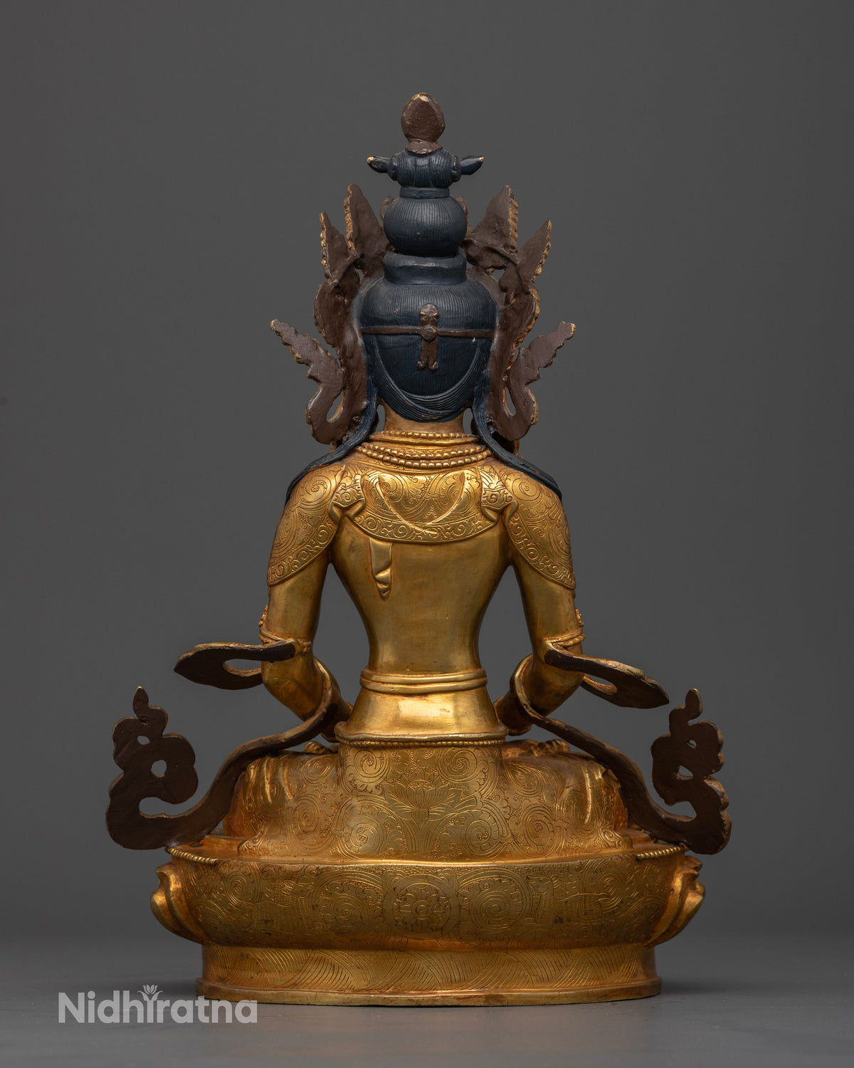 Gold-gilded Amitayus Buddha sculpture featuring intricate floral carvings and traditional lost-wax casting craftsmanship