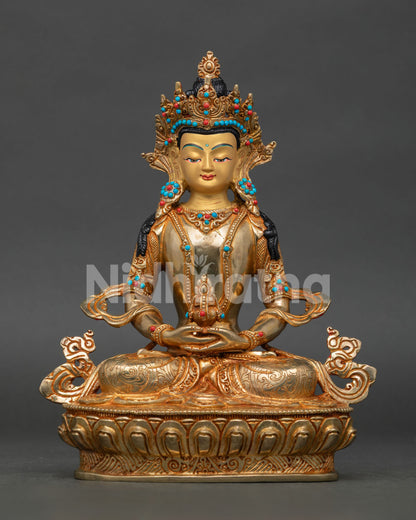 Gold gilded Amitayus Buddhist sculpture with flowing robes and nepalese craftsmanship.