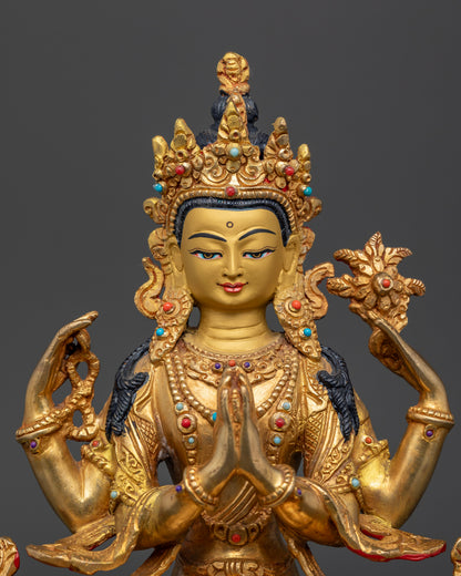 Gold-gilded Chenrezig Buddhist sculpture with a gold-painted face and intricate ornamental carvings