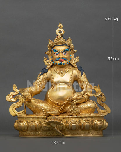 Gold gilded Dzambhala copper statue front view with citron, mongoose and lotus throne