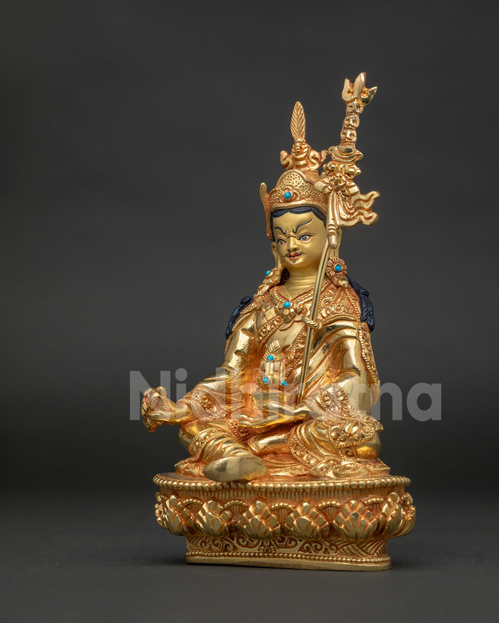Gold-Gilded Guru Rinpoche statue with hand carved lotus pedestal and royal garment.