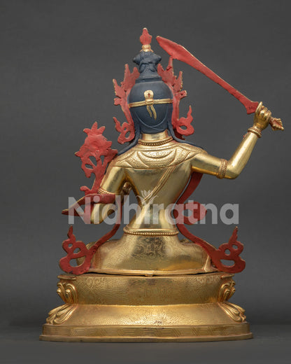 Gold gilded Manjushri Statue with Newari craftsmanship and wisdom symbolism.