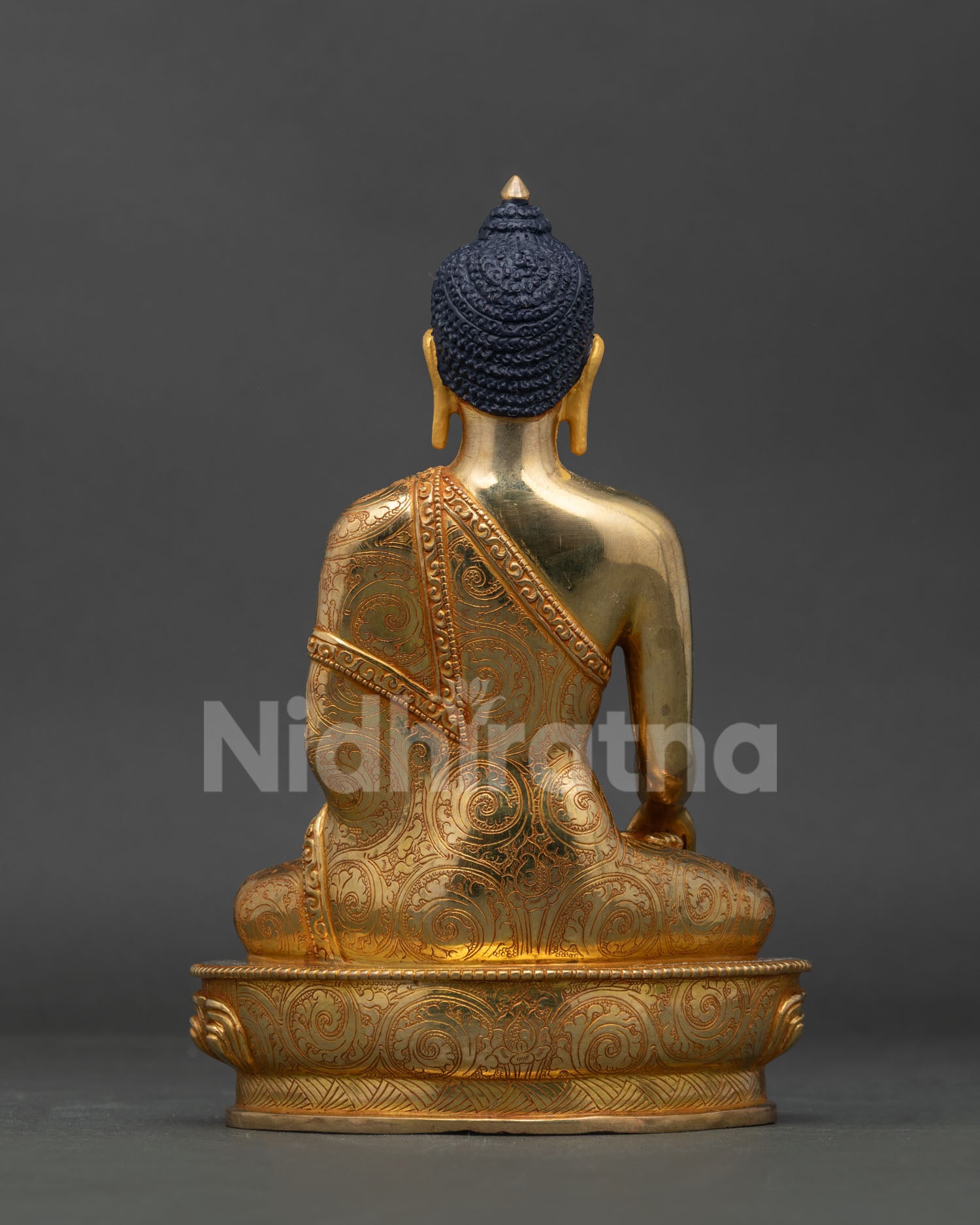 Gold gilded Mitrugpa statue Newari craftsmanship floral cloud robe detail.