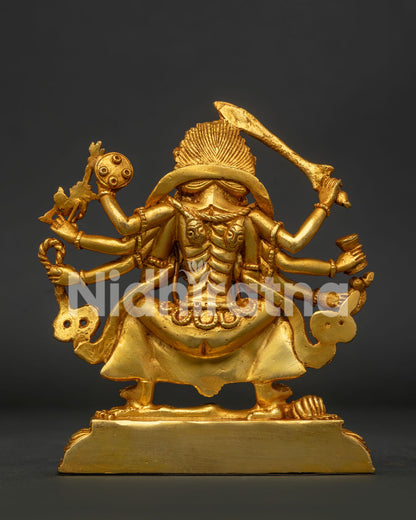 Gold gilded Nyatabhulu Ajima statue with raised sword and sacred tantric ornaments