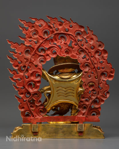 Gold gilded Six-Armed Mahakala Buddhist protector statue with blazing halo.