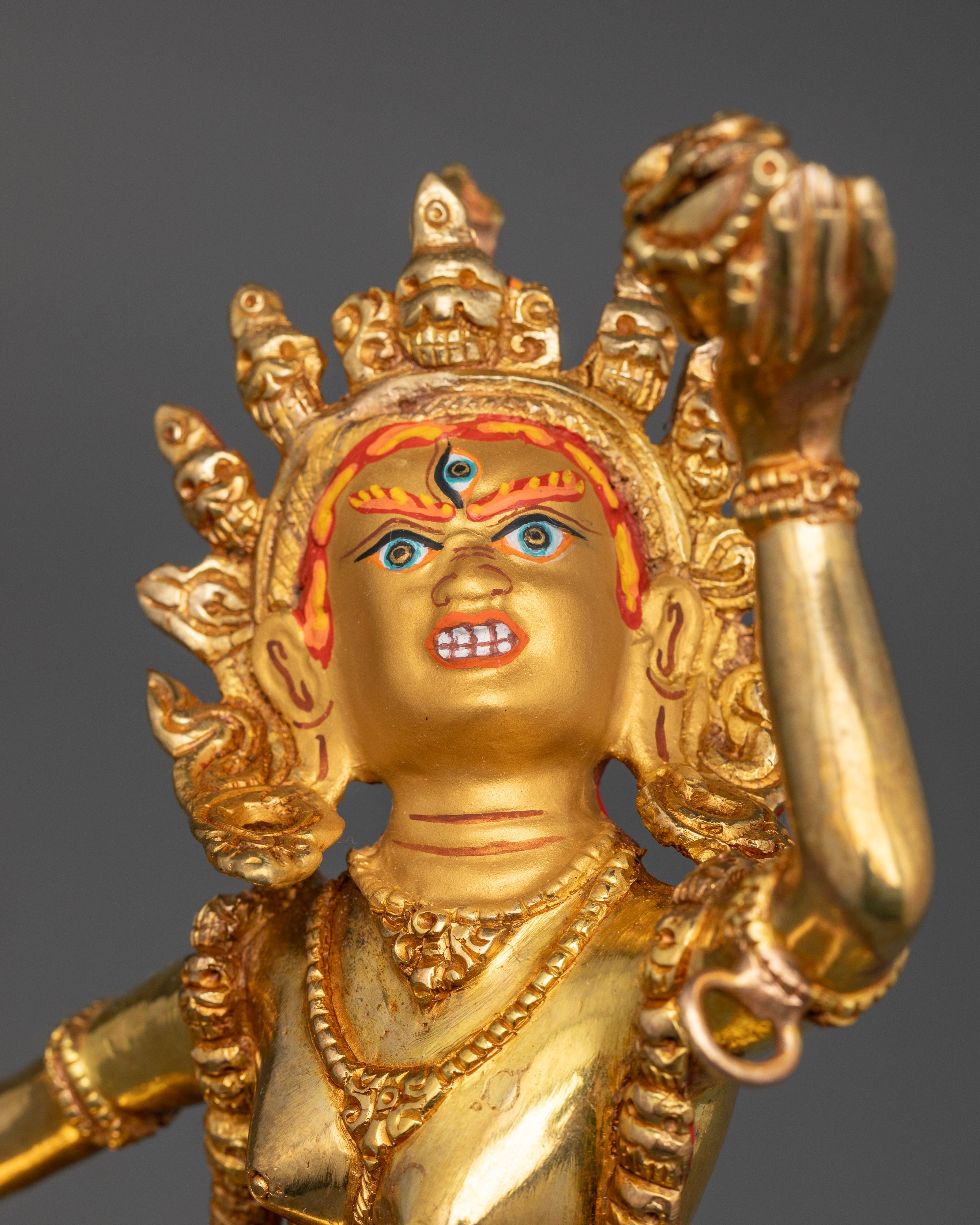 Gold gilded Vajrayogini statue with 24K gold painted face and lotus pedestal.