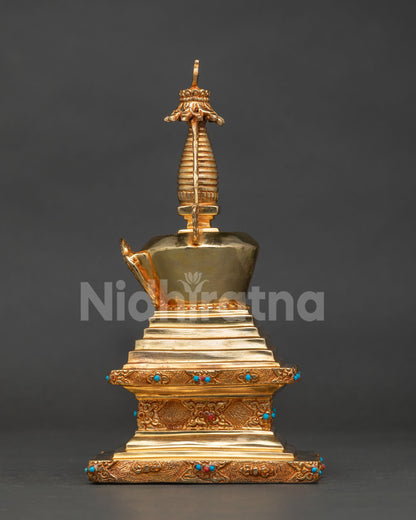 Gold-plated Buddha Shakyamuni Stupa adorned with semi-precious stones