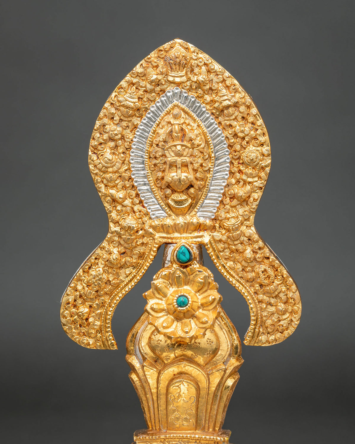 Gold-plated copper Torma offering adorned with semi-precious stones and intricate Nepalese craftsmanship