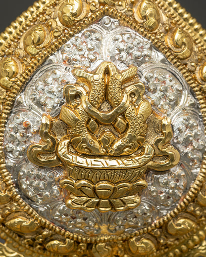 Golden Fishes Astamangala symbol in copper with gold and silver plating representing freedom happiness and abundance within Buddhist teachings
