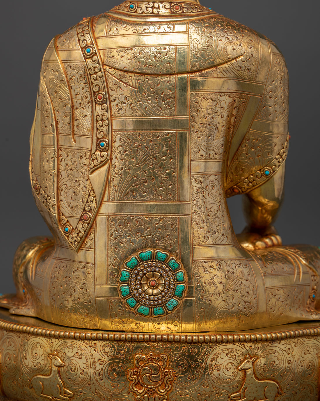 back profile of golden shakyamani buddha statue