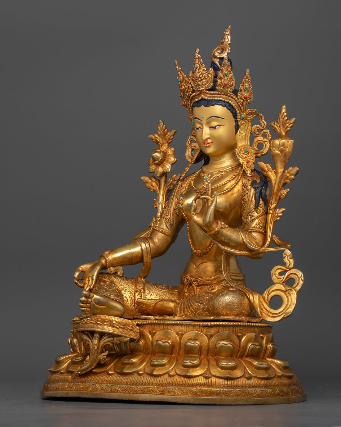 side profile of gold plated green tara statue with height 37 cm