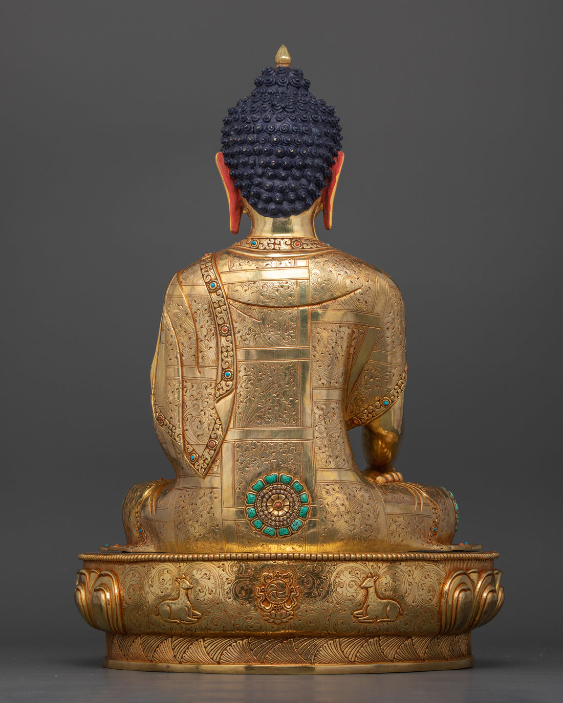 back profile of golden shakyamuni buddha statue