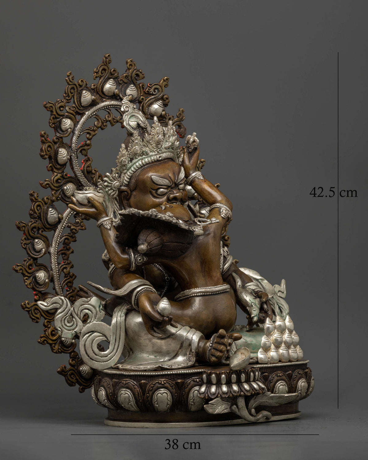 Green Dzambhala and Vasudhara statue with mongoose and kapala